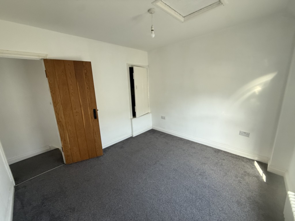 Lot: 99 - REFURBISHED TWO-BEDROOM TERRACED PROPERTY - Bedroom one with airing cupboard